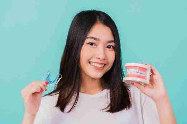 Discover how discreet aligners can transform your smile and boost dental health with ease, no brackets, no hassle.